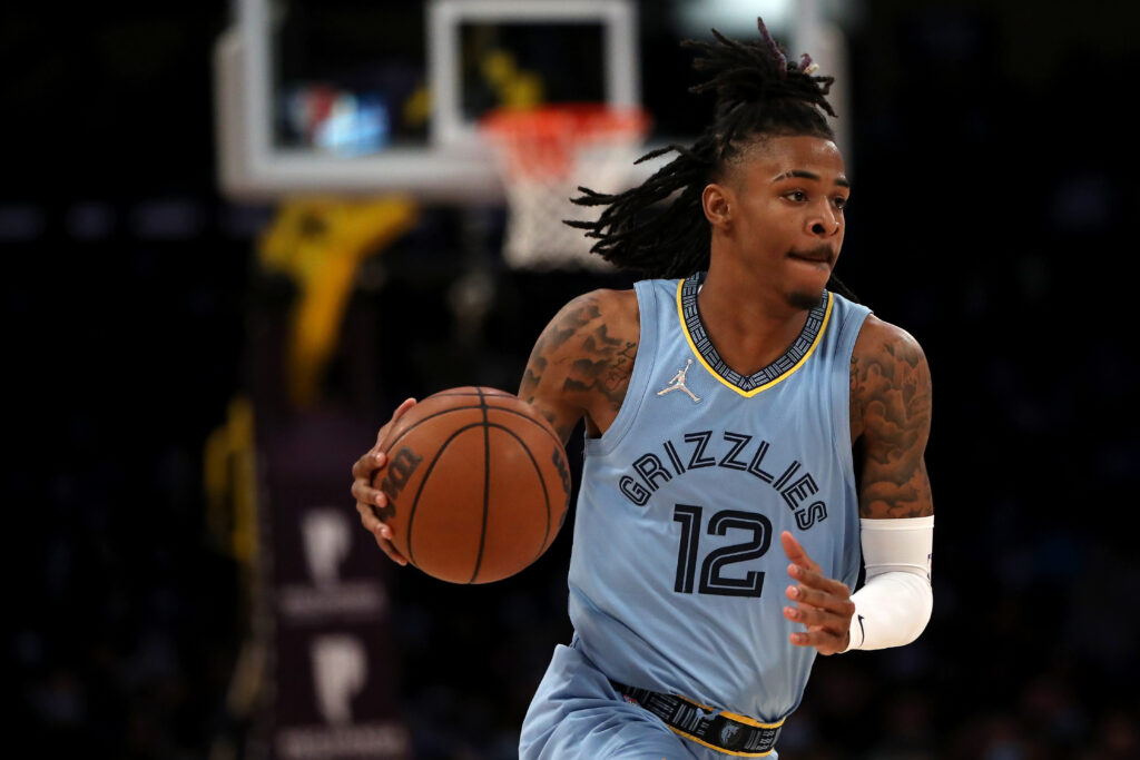 Ja Morant #12 of the Memphis Grizzlies dribbles during the third quarter against the Los Angeles Lakers at Crypto.com Arena on January 09, 2022 in Los Angeles, California.